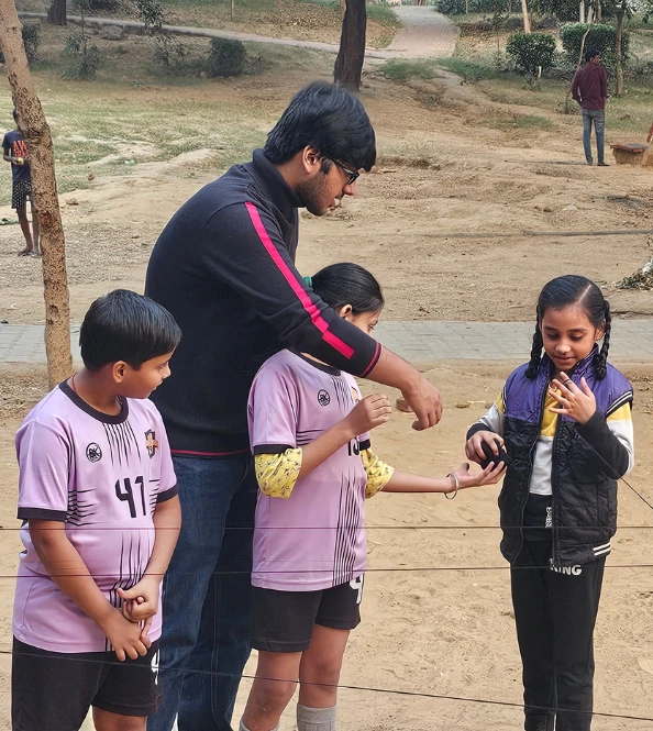 Udaykriti Foundation's Volutneers conducting session through sports and activities.